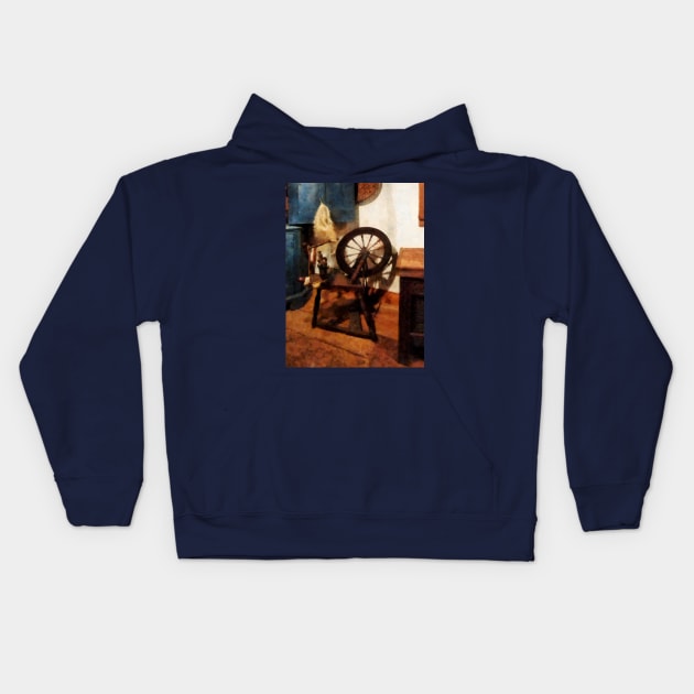 Small Spinning Wheel Kids Hoodie by SusanSavad